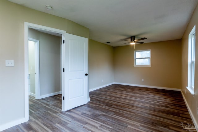 unfurnished room with ceiling fan and wood-type flooring