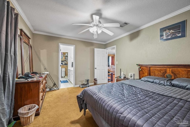 bedroom featuring light carpet, a textured ceiling, visible vents, and crown molding