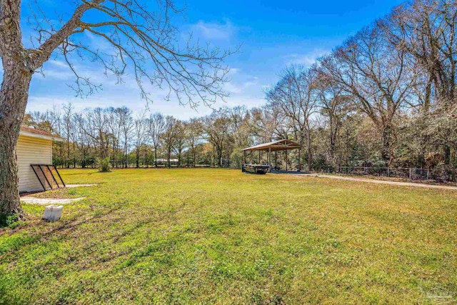 view of yard featuring a carport