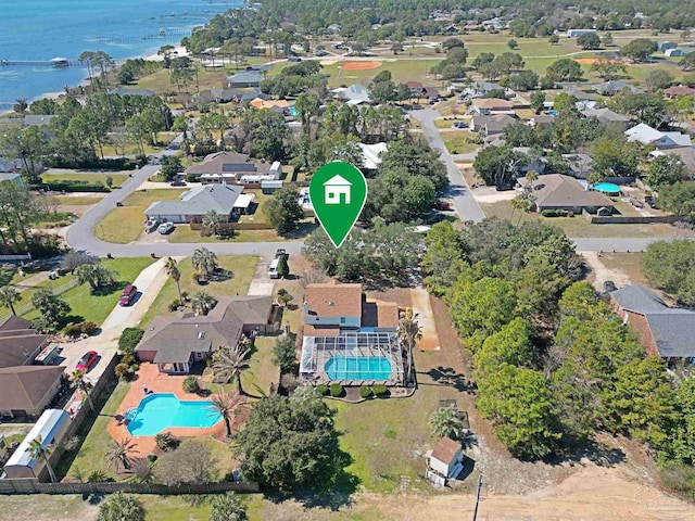 aerial view with a water view and a residential view