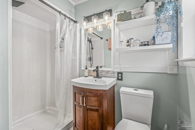 bathroom with vanity, curtained shower, and toilet