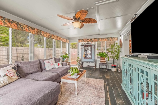 sunroom / solarium featuring vaulted ceiling and ceiling fan