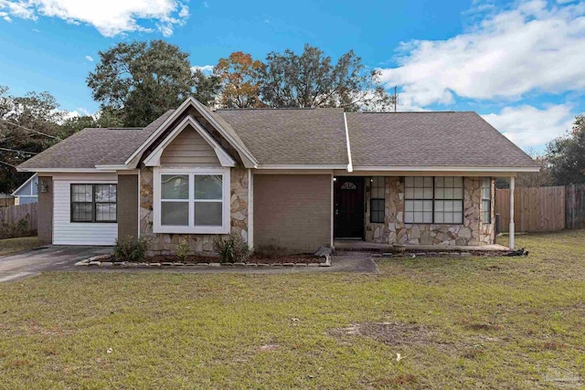 ranch-style home with a front yard