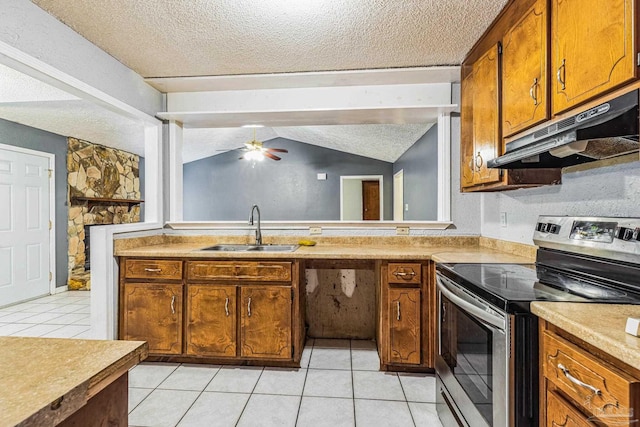 kitchen featuring ceiling fan, sink, a textured ceiling, vaulted ceiling, and stainless steel electric stove