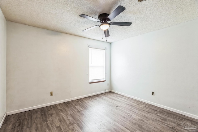 unfurnished room with hardwood / wood-style floors, a textured ceiling, and ceiling fan