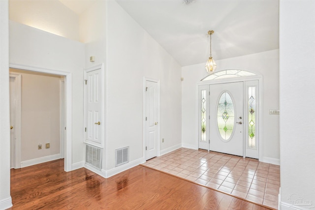 foyer with light hardwood / wood-style flooring