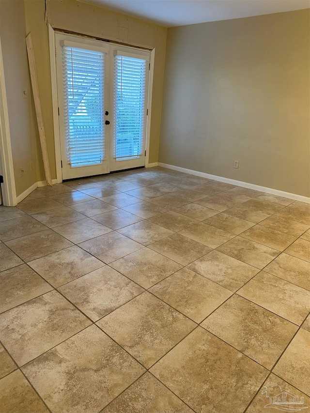 spare room with french doors