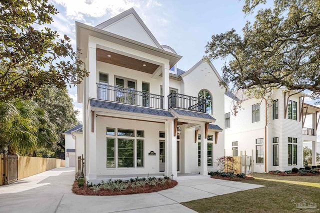 view of front of home with a balcony