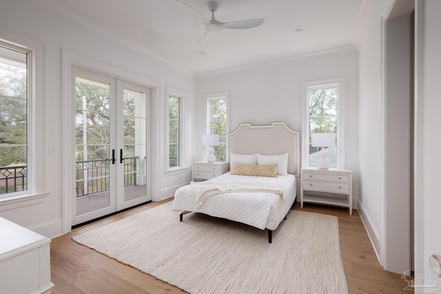 bedroom featuring baseboards, a ceiling fan, light wood-style flooring, access to outside, and french doors