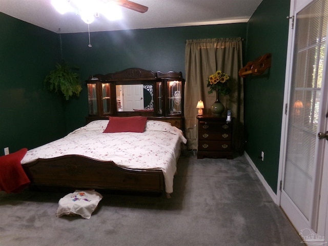 bedroom with ceiling fan and carpet flooring