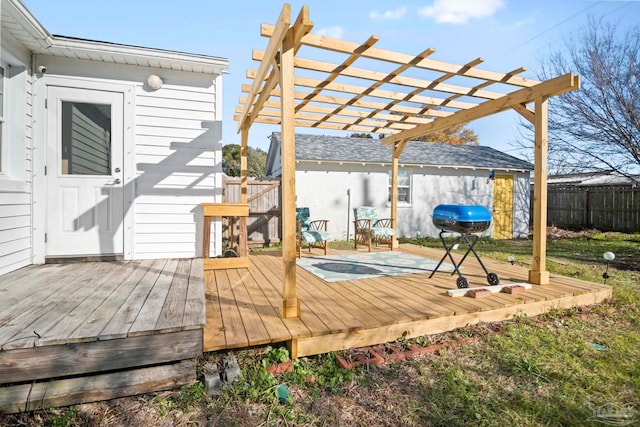 wooden deck featuring a pergola and a swimming pool