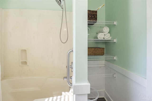 full bath with bathing tub / shower combination
