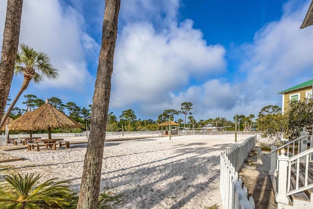 view of property's community with volleyball court and a gazebo