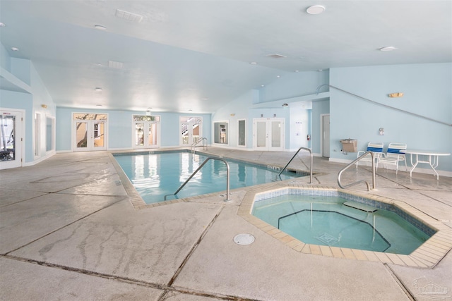 indoor pool with an in-ground hot tub