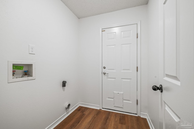 laundry room with dark wood-style floors, baseboards, hookup for an electric dryer, hookup for a washing machine, and laundry area