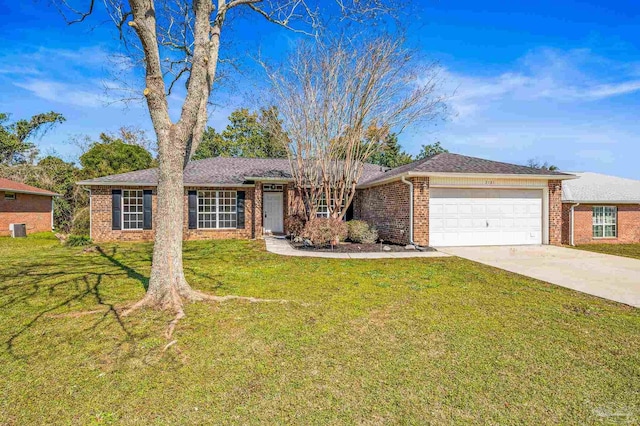 ranch-style house with brick siding, an attached garage, concrete driveway, and a front yard