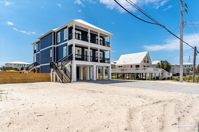 8169 White Sands Blvd, Navarre Beach, FL 32566 - view of property featuring stairs