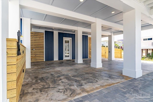 8169 White Sands Blvd, Navarre Beach, FL 32566 - view of exterior entry with board and batten siding