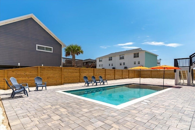 8169 White Sands Blvd, Navarre Beach, FL 32566 - view of pool featuring a patio area and a fenced backyard