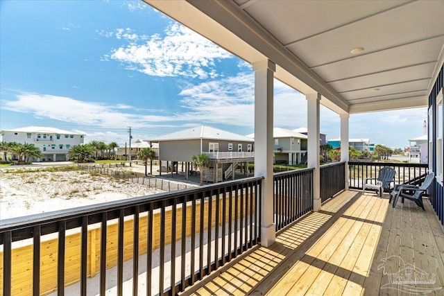 8169 White Sands Blvd, Navarre Beach, FL 32566 - wooden terrace with a residential view