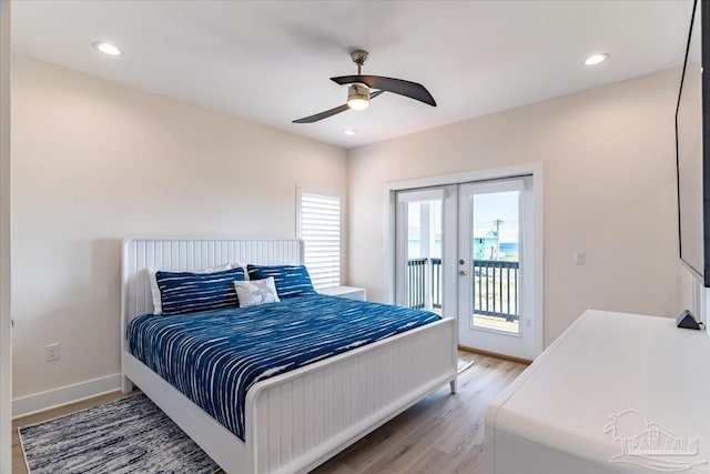 8169 White Sands Blvd, Navarre Beach, FL 32566 - bedroom featuring french doors, access to outside, light wood-style flooring, baseboards, and a ceiling fan