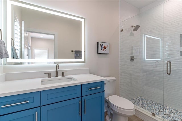 8169 White Sands Blvd, Navarre Beach, FL 32566 - full bathroom featuring toilet, a stall shower, and vanity