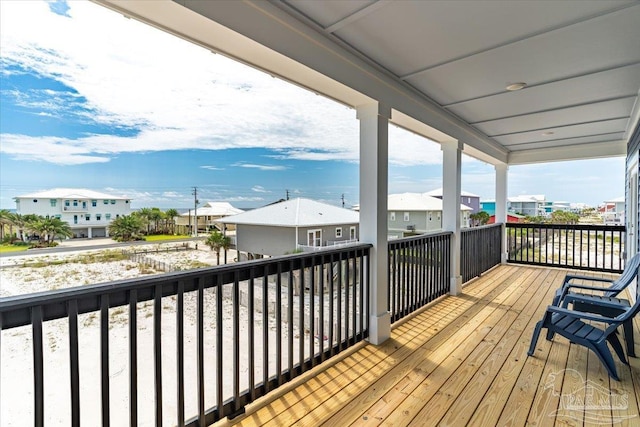 8169 White Sands Blvd, Navarre Beach, FL 32566 - wooden deck featuring a residential view