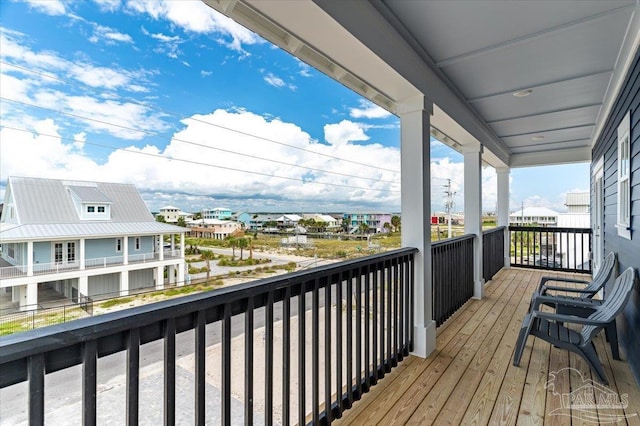 8169 White Sands Blvd, Navarre Beach, FL 32566 - wooden terrace featuring a residential view