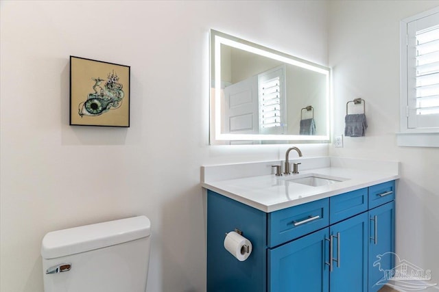 8169 White Sands Blvd, Navarre Beach, FL 32566 - bathroom with toilet and vanity
