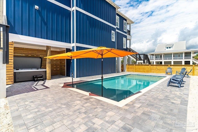 8169 White Sands Blvd, Navarre Beach, FL 32566 - swimming pool with a patio area