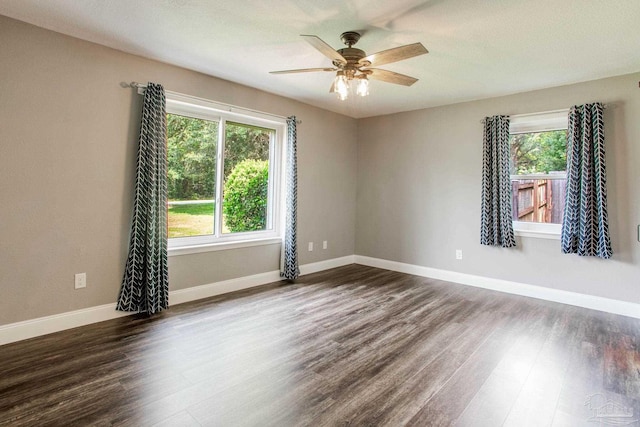 8818 Klondike Rd, Pensacola, FL 32526 - unfurnished room with dark wood finished floors and ceiling fan