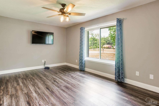 8818 Klondike Rd, Pensacola, FL 32526 - empty room with dark wood-style floors and a ceiling fan