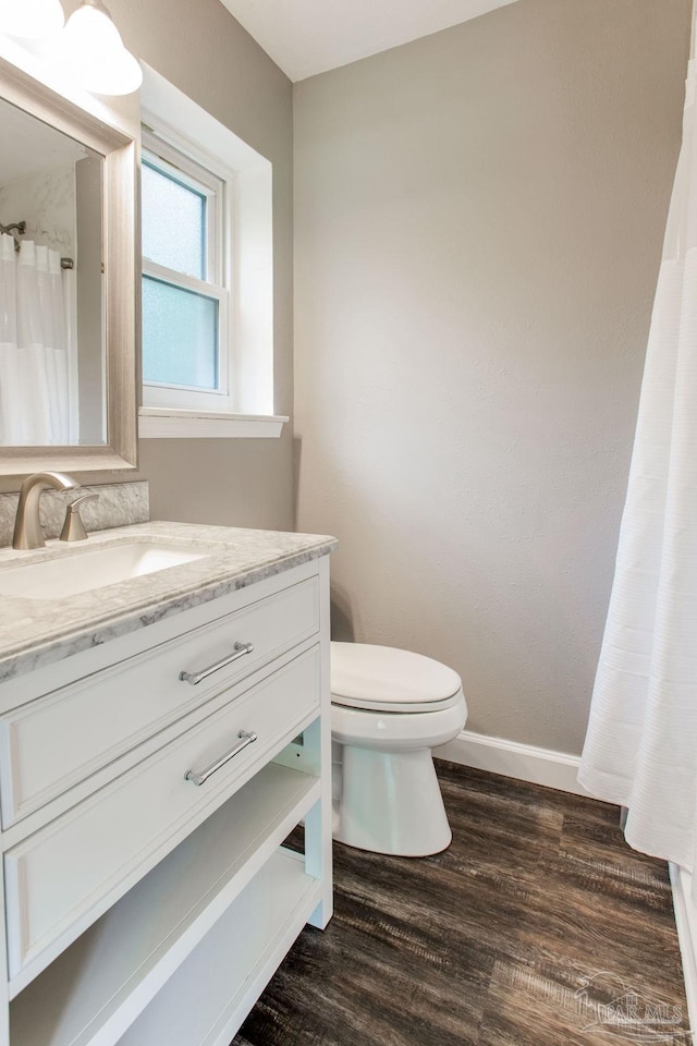 8818 Klondike Rd, Pensacola, FL 32526 - bathroom featuring vanity and wood finished floors