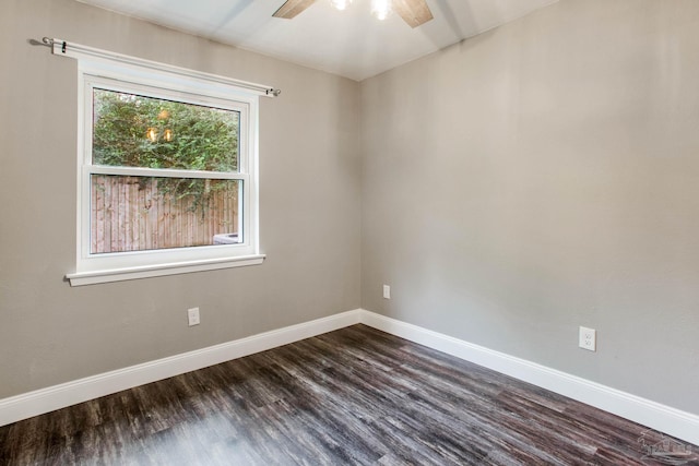8818 Klondike Rd, Pensacola, FL 32526 - spare room featuring ceiling fan and dark wood-style flooring