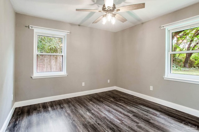 8818 Klondike Rd, Pensacola, FL 32526 - unfurnished room with healthy amount of natural light, dark wood finished floors, and a ceiling fan