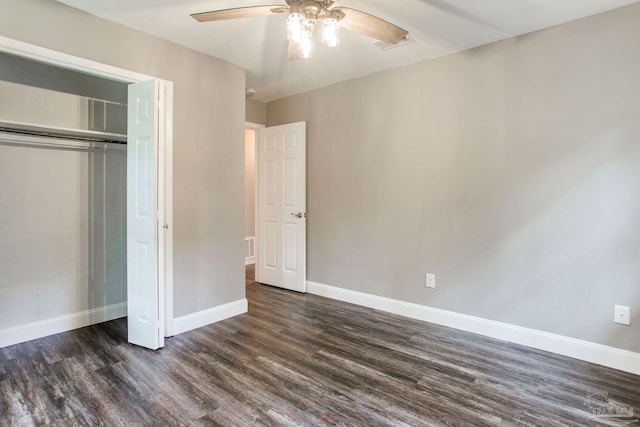 8818 Klondike Rd, Pensacola, FL 32526 - unfurnished bedroom featuring dark wood-style floors, a closet, and ceiling fan