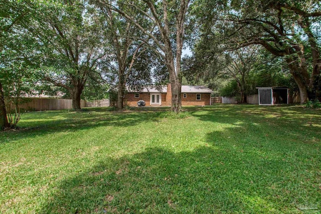 8818 Klondike Rd, Pensacola, FL 32526 - view of yard featuring an outdoor structure
