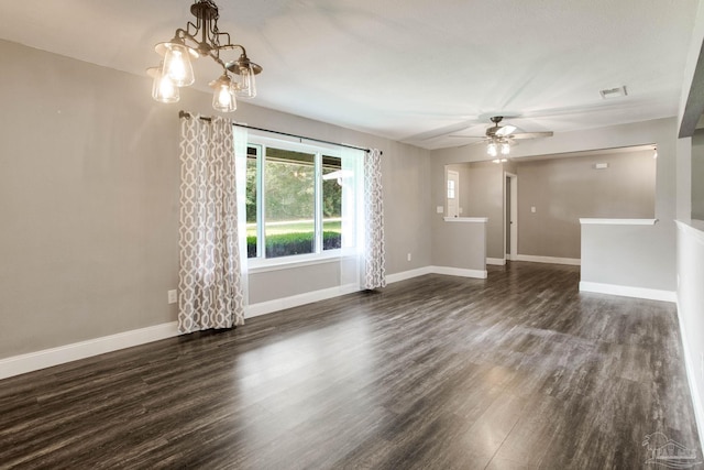 8818 Klondike Rd, Pensacola, FL 32526 - unfurnished living room with a ceiling fan, dark wood-style floors, and a chandelier