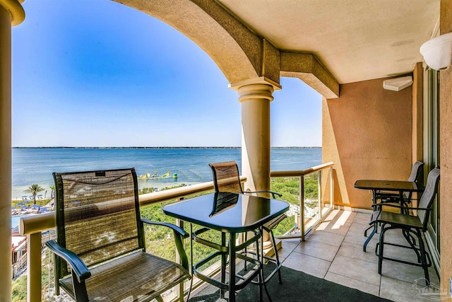 balcony featuring a water view