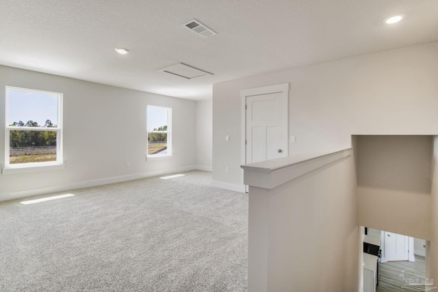 9797 Windyhill Rd, Pensacola, FL 32526 - carpeted empty room featuring baseboards, recessed lighting, and attic access