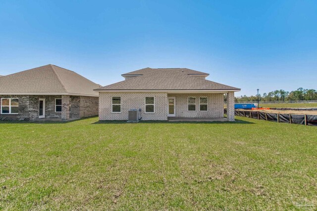 9797 Windyhill Rd, Pensacola, FL 32526 - back of property featuring cooling unit and brick siding