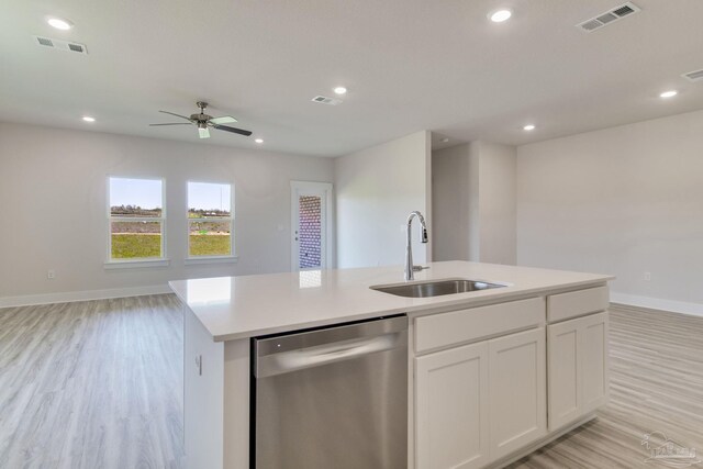 9797 Windyhill Rd, Pensacola, FL 32526 - kitchen with stainless steel dishwasher, a sink, open floor plan, light wood-style floors, and recessed lighting