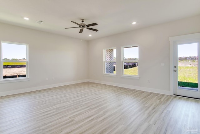 9797 Windyhill Rd, Pensacola, FL 32526 - spare room featuring light wood-style flooring, healthy amount of natural light, a ceiling fan, baseboards, and recessed lighting