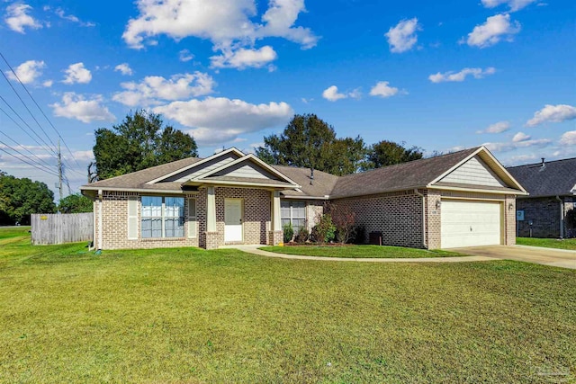 view of front of home featuring a front yard and a garage