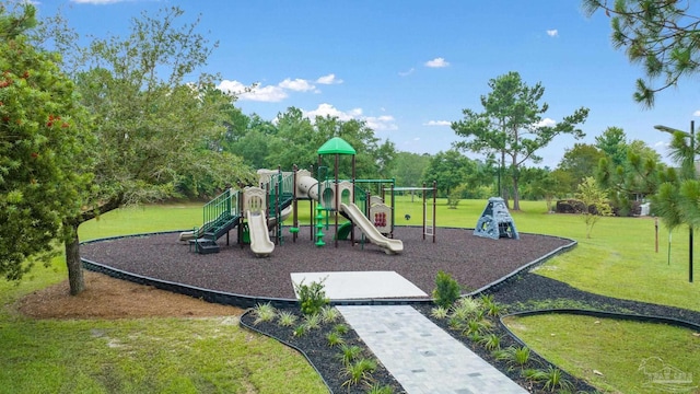 view of jungle gym featuring a lawn