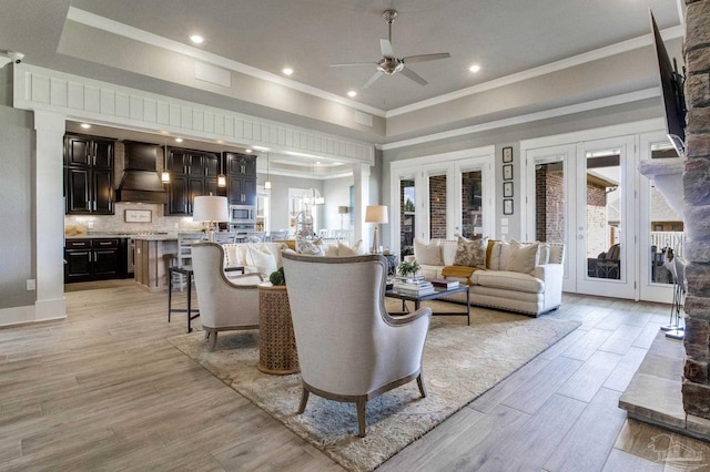 2420 Meeting St, Cantonment, FL 32533 - living area featuring french doors, light wood-type flooring, a ceiling fan, and ornamental molding