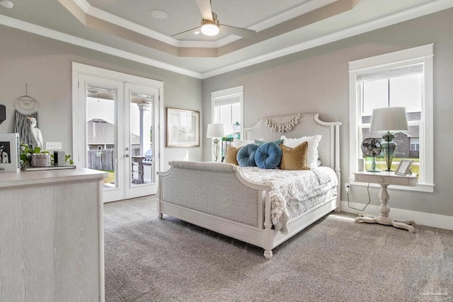 2420 Meeting St, Cantonment, FL 32533 - bedroom with ornamental molding, carpet floors, access to exterior, a raised ceiling, and french doors