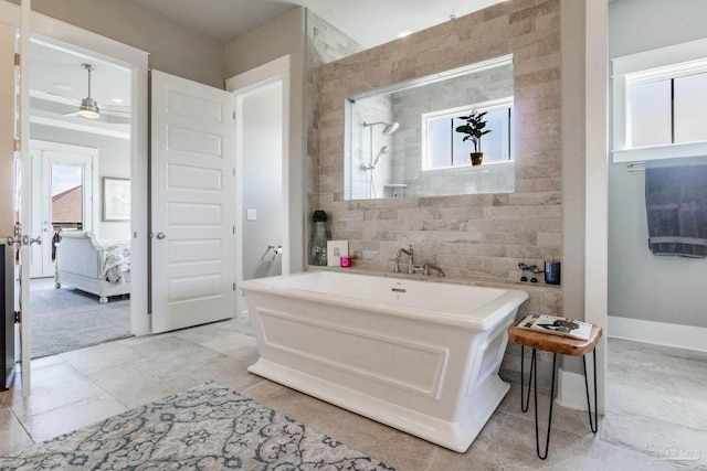 2420 Meeting St, Cantonment, FL 32533 - bathroom with a freestanding bath, a wealth of natural light, tiled shower, and ceiling fan
