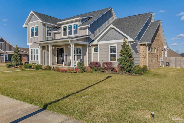2420 Meeting St, Cantonment, FL 32533 - craftsman house with board and batten siding, a front lawn, covered porch, and roof with shingles