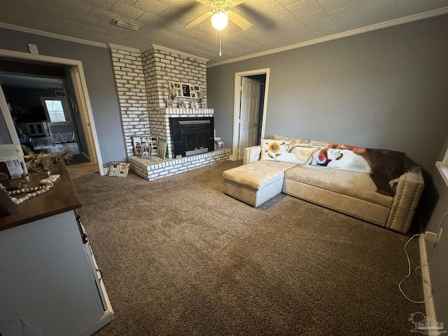 carpeted living room featuring a fireplace, ornamental molding, and ceiling fan